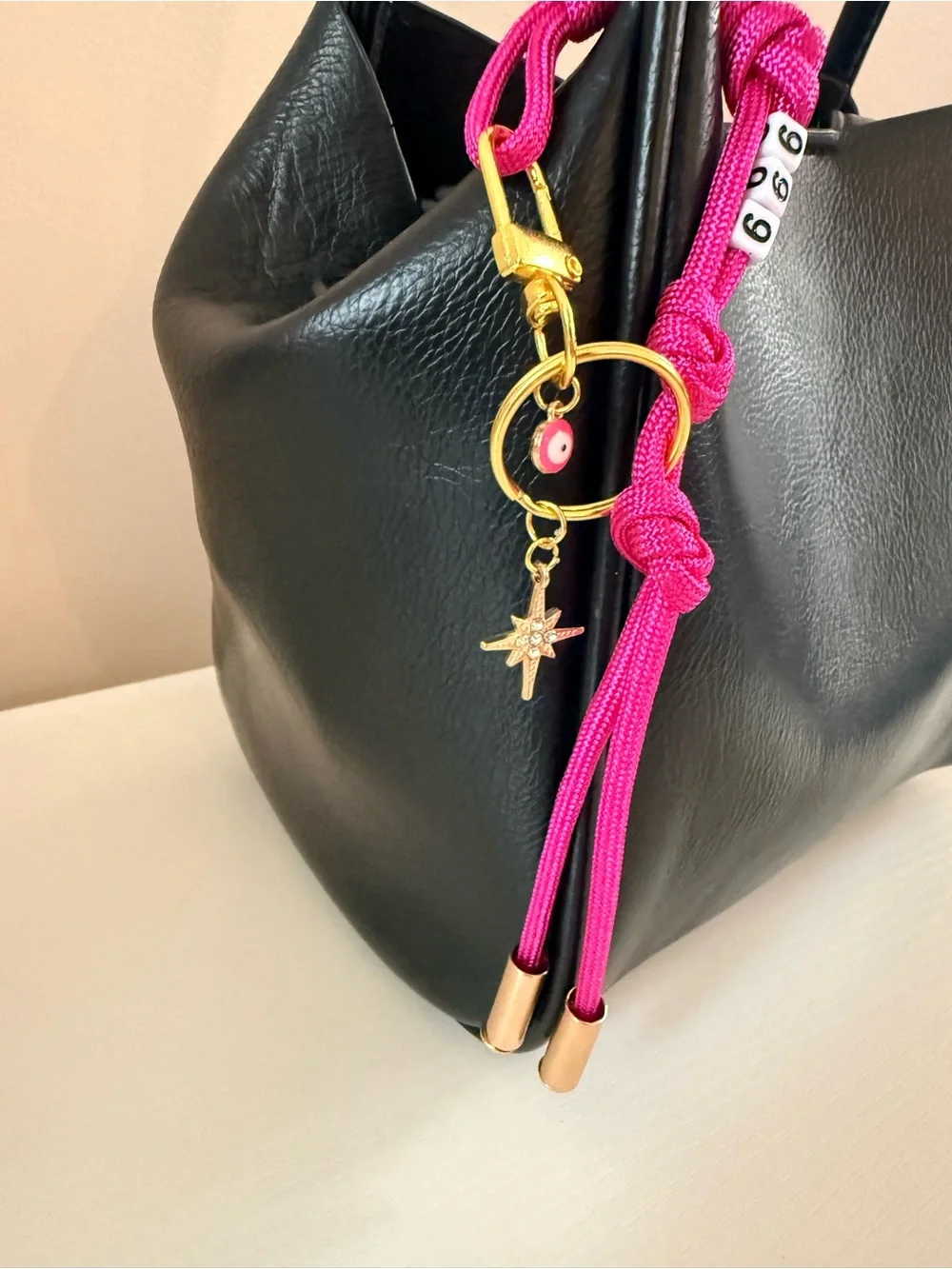 NEW 999 Angel Number Pink/Magenta Evil Eye North Star crystal Gold bag charm